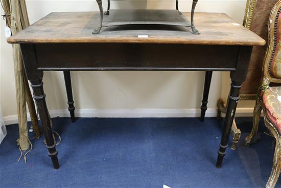 A Heal & Sons pine top ebonised side table 3ft 6in.